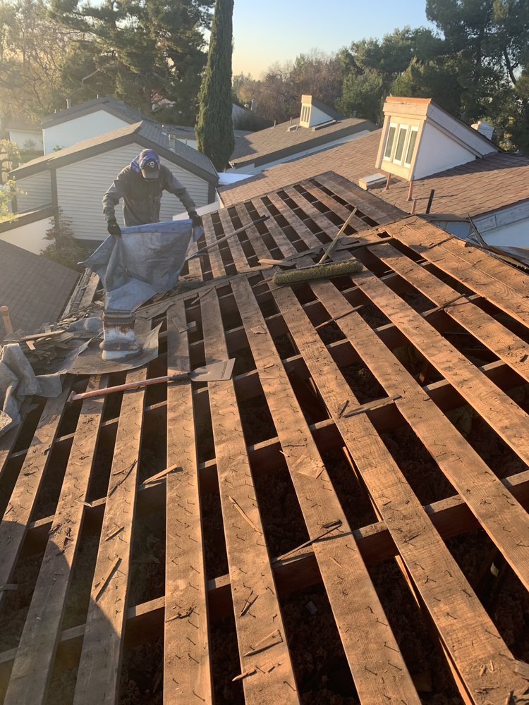 Slide of Baiza's Roofing