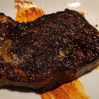 Eddie V's Prime Seafood - 18 oz USDA Prime Bone-in New York Strip with Smoked Chili Rub - Seafood Near Me - Oak Brook, Illinois