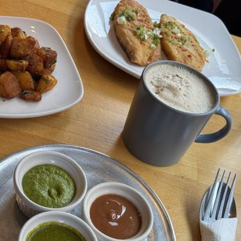Namaste Café - Chai, fish, and potatoes with yummy sauce sauces. My favorite meal at Namaste. - Indian Near Me - Minneapolis, Minnesota Namaste Café - Chai, fish, and potatoes with yummy sauce sauces. My favorite meal at Namaste. - Indian Near Me - Minneapolis, Minnesota