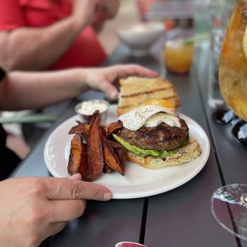 Poppy - Lamb burger with sweet potato fries (I hate sweet potato but loved these!) Topped with egg sunny side up - Cocktail Bars Near Me - Cleveland, Ohio Poppy - Lamb burger with sweet potato fries (I hate sweet potato but loved these!) Topped with egg sunny side up - Cocktail Bars Near Me - Cleveland, Ohio