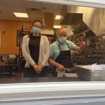 Theo's Cozy Corner - Nina and Theo at the takeout window. - Breakfast & Brunch Near Me - Boston, Massachusetts