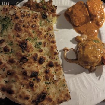 Kiran's - Garlic naan and chicken tikka masala - Indian Near Me - Houston, Texas Kiran's - Garlic naan and chicken tikka masala - Indian Near Me - Houston, Texas