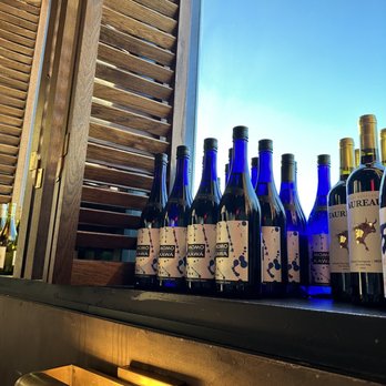 Little Purse - bottles of wine on a window sill - Dim Sum Near Me - Newark, New Jersey Little Purse - bottles of wine on a window sill - Dim Sum Near Me - Newark, New Jersey