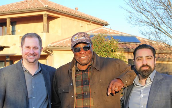 Photo of SunSystem Technology - Rancho Cordova, CA, US. SST CEO Derek Chase (left) and CFO Mehrad Saidi (right) with MLB legend and owner of Baker Energy Team Dusty Baker (middle).