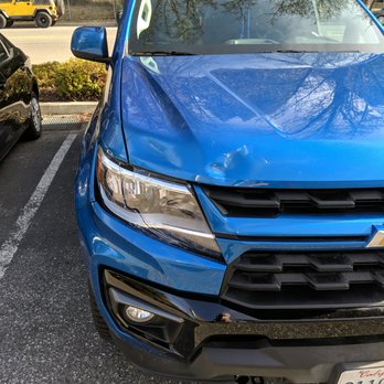 Tripp's Auto Body - Deer damage to the hood - Body Shops Near Me - Grass Valley, California