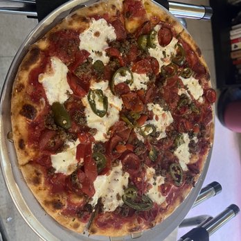 Rigo’s Pizzeria - Spicy Honey Pizza - Pizza Near Me - Cary, North Carolina Rigo’s Pizzeria - Spicy Honey Pizza - Pizza Near Me - Cary, North Carolina