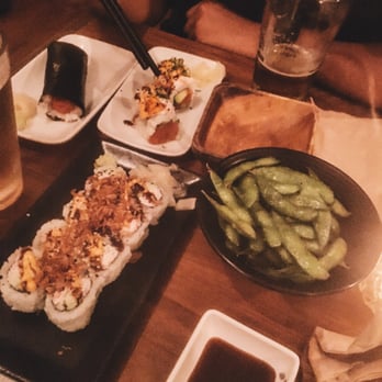 Ebaes - The spread! Dragon roll, California rolls, spicy tuna, edamame and alcohol!! - Ramen Near Me - Los Angeles, California