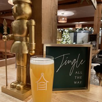 River Junction Brewing - a pint of beer and a statue - Breweries Near Me - Sanford, Maine