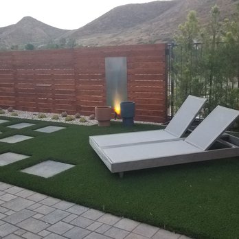 Valley Pacific Landscape - a patio with a lounger and a fire pit - Landscape Architects or Designers Near Me