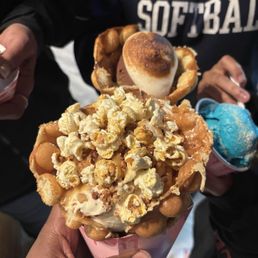 Caramel popcorn, ice cream with big waffle cone Caramel popcorn, ice cream with big waffle cone