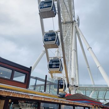 The Crab Pot - The Ferris Wheel outside the building - Seafood Near Me - Seattle, Washington The Crab Pot - The Ferris Wheel outside the building - Seafood Near Me - Seattle, Washington