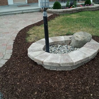 Root Plus - a fire pit in the front yard - Landscaping Near Me - Ottawa, Ontario Root Plus - a fire pit in the front yard - Landscaping Near Me - Ottawa, Ontario