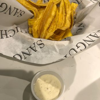 Sanguich - Plantains with garlic cilantro sauce - Cuban Near Me - Miami, Florida Sanguich - Plantains with garlic cilantro sauce - Cuban Near Me - Miami, Florida
