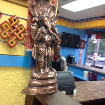 Katmandu Bazaar - Small bar and tables in rear - International Grocery Near Me - Concord, New Hampshire