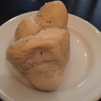 Gravy - Garlic knots that came with dinner - Italian Near Me - Raleigh, North Carolina