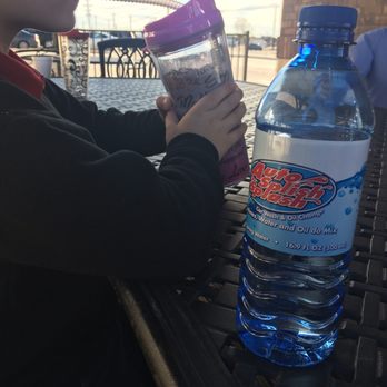 Auto Splish Splash - Enjoying his carbonated beverage as we wait for our car to be cleaned - Car Wash Near Me - Frisco, Texas