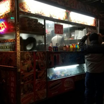 Halal Cart - a man standing in front of a food cart - Food Stands Near Me - Manhattan, New York Halal Cart - a man standing in front of a food cart - Food Stands Near Me - Manhattan, New York