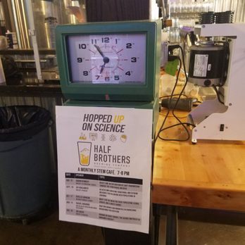 Half Brothers Brewing - Time clock punching station (you can clock in when you order food and you get free goods when you rack up punches) - Breweries Near Me - Grand Forks, North Dakota
