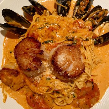 Ciao Amici's - a plate of pasta and musselling - Italian Near Me - Brighton, Michigan