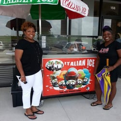 Philly Flava Italian Ice - Our little Yum, Yum leanding a helping hand serving up a cup Big Daddy Mya favorite.