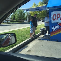 Husband and son enjoying the perks of warm weather. Husband and son enjoying the perks of warm weather.