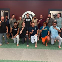New Visions Dojo - Father's Day class was so fun...and hard work. They made it!