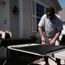 In Home Screen Replacement - Mike replacing screen material