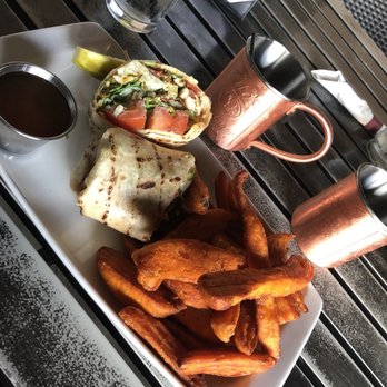 Avenue American Bistro - Chicken bacon ranch wrap with sweetpotato fries - Sports Bars Near Me - Wayne, Michigan Avenue American Bistro - Chicken bacon ranch wrap with sweetpotato fries - Sports Bars Near Me - Wayne, Michigan