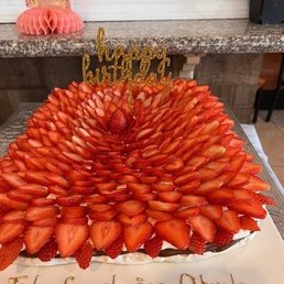 Pavlova cake.   Perfect if you have a sweet tooth!  It was gone in a flash.