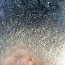 In The Cut Barbershop - The curve in the line from the fade to skin is shaky. No crisp line or c curve. Horrible.