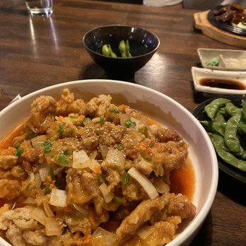 Zu Izakaya - I got the Kkanpungi dish which is korean fried chicken. My boyfriend got the Fresh Water Eel Grill. - Asian Fusion Near Me - Tempe, Arizona