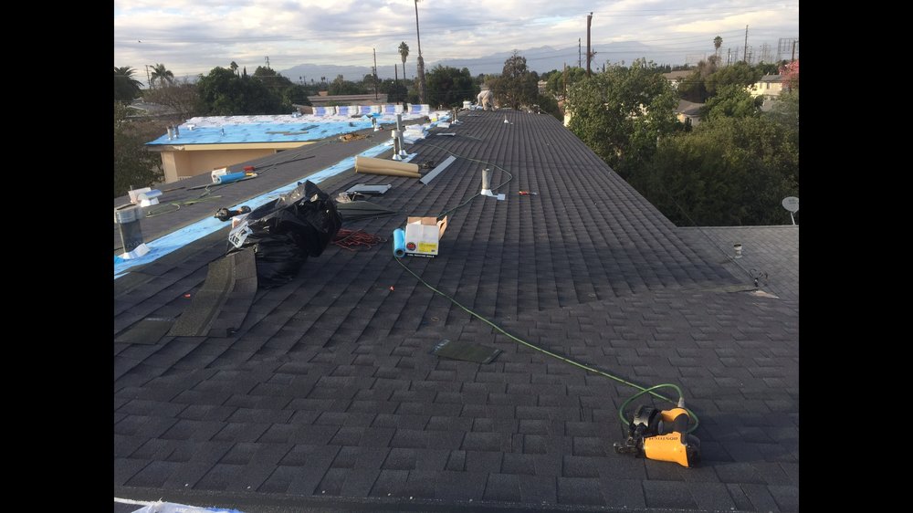 Slide of Ruiz Roofing Construction