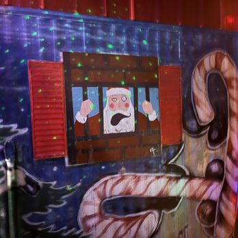 Santa's Pub - a man looking out of a window - Karaoke Near Me - Nashville, Tennessee Santa's Pub - a man looking out of a window - Karaoke Near Me - Nashville, Tennessee