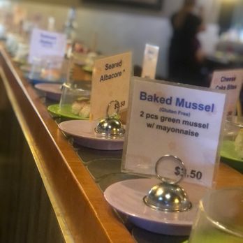 Sushi Tokoro - plates of food on a counter - Sushi Bars Near Me - Phoenix, Arizona Sushi Tokoro - plates of food on a counter - Sushi Bars Near Me - Phoenix, Arizona