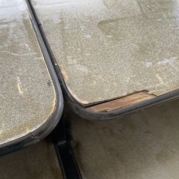 Party Pro - This bar top has seen better days. Thankfully I had a black tablecloth that I was able to use to cover the top. - Costumes Near Me - Fontana, California