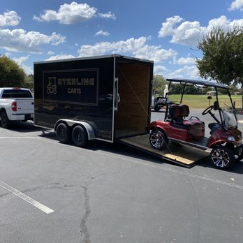 Sterling Electric Vehicles - 2025 Evolution Classic 2 Plus electric golf cart with Sterling Carts branded delivery trailer - Golf Cart Dealers Near Me - Austin, Texas Sterling Electric Vehicles - 2025 Evolution Classic 2 Plus electric golf cart with Sterling Carts branded delivery trailer - Golf Cart Dealers Near Me - Austin, Texas