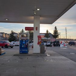 Esso - Gas pump with the car wash behind it