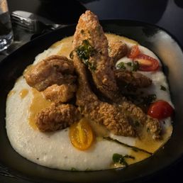 Fried catfish and grits with a side of sautéed summer squash. Delicious!