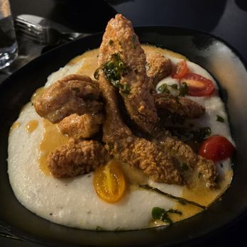 Humble Baron - Fried catfish and grits with a side of sautéed summer squash. Delicious! - Cocktail Bars Near Me - Shelbyville, Tennessee