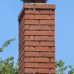Mary Poppins Chimney Service - Chimney with new caps