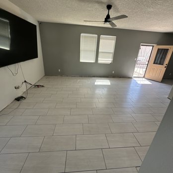 Extra Mile Builders - New tile entire first floor - General Contractors Near Me