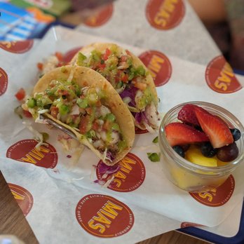 Mia's Table - Shrimp tacos with a serving of fresh fruit. - American Near Me - Webster, Texas Mia's Table - Shrimp tacos with a serving of fresh fruit. - American Near Me - Webster, Texas