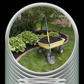 Pro Turf Landscape Services - a wheelbarrow in a garden - Lawn Services Near Me - Brownsboro, Alabama Pro Turf Landscape Services - a wheelbarrow in a garden - Lawn Services Near Me - Brownsboro, Alabama