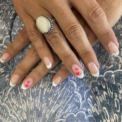 In'Dulgence Nail Spa - I have had both pedicure and manicure with gel nail polish and designs. Excellent customer service and very clean salon. Love the owners!