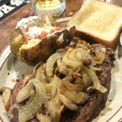 Offsides Tavern - Ribeye..we had it 3 times smothered in grilled onions and mushrooms.  Loaded baked potato, salad and Texas toast.  This steak Is to die for.