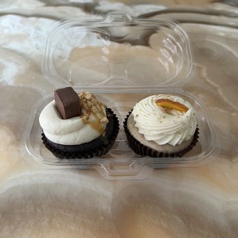 Sugar Ray's Bake Shop - Snickers cupcake on the left, Peach Cobbler on the right. So good!!! - Bakeries Near Me - Plano, Texas