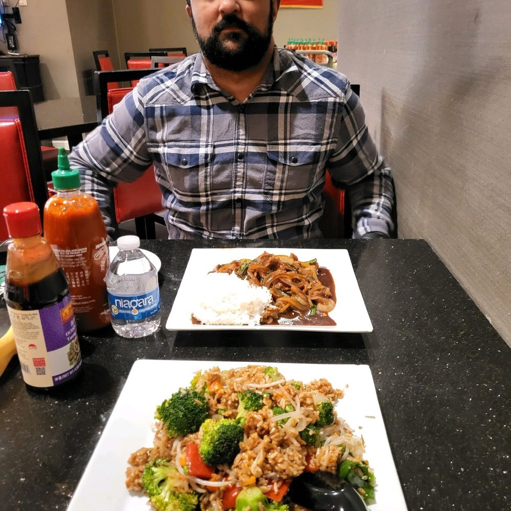 Asian Cafe - Vegetable fried rice (bottom), Mongolian Beef (top) - Chinese Near Me - Bossier City, Louisiana Asian Cafe - Vegetable fried rice (bottom), Mongolian Beef (top) - Chinese Near Me - Bossier City, Louisiana