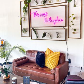 Cypress Drinkery - a living room with a couch and a coffee table - Coffee & Tea Near Me - Charlotte, North Carolina Cypress Drinkery - a living room with a couch and a coffee table - Coffee & Tea Near Me - Charlotte, North Carolina