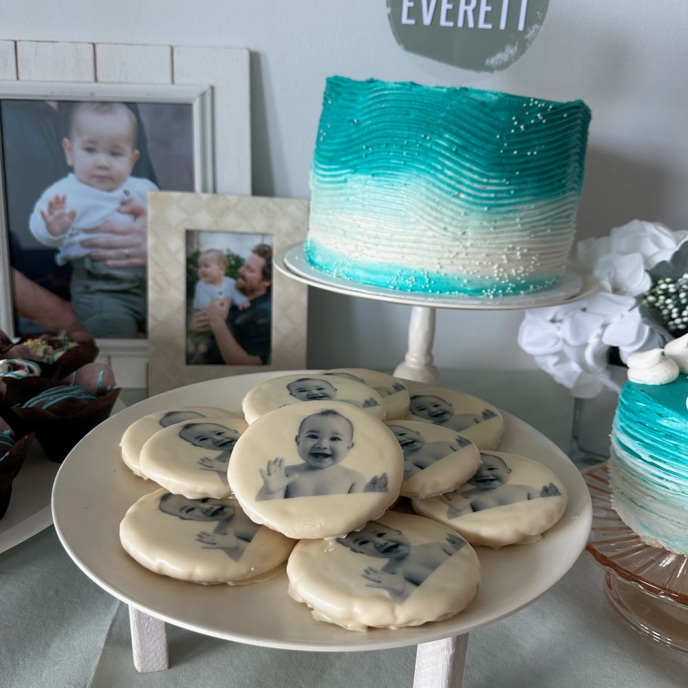 a cake and cookies for a baby shower a cake and cookies for a baby shower