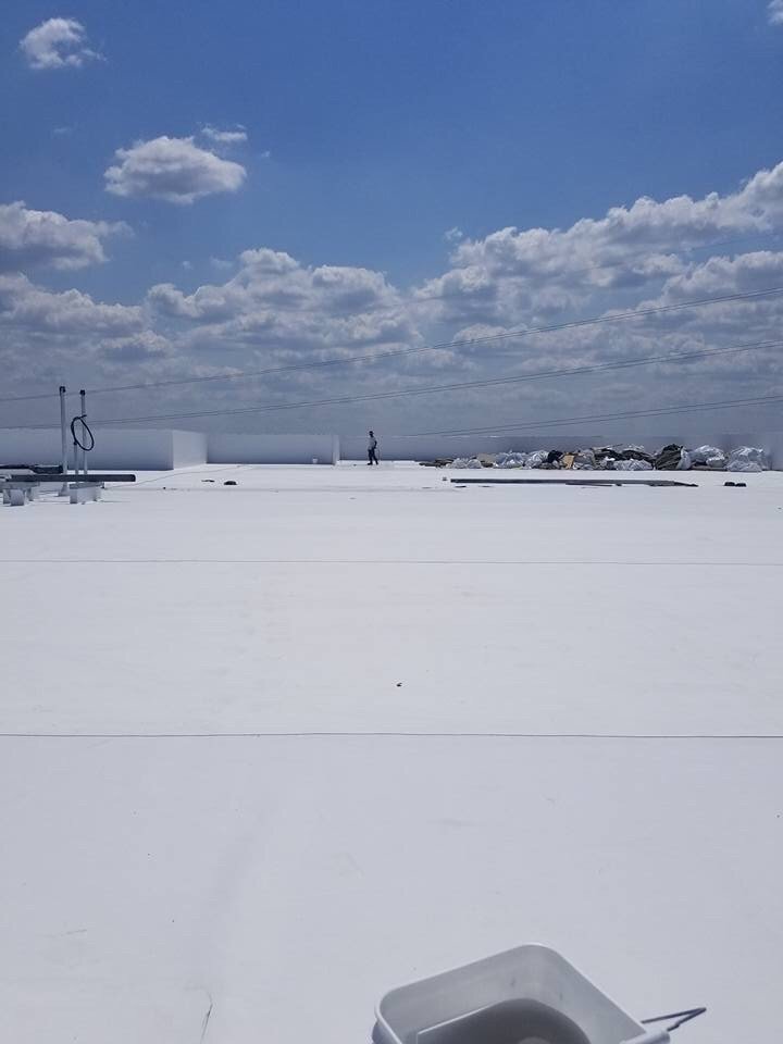 Slide of Roland's Roofing